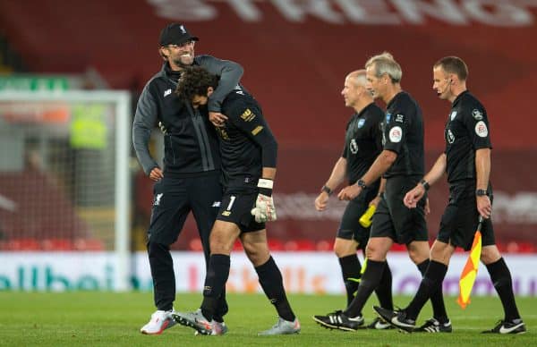 LIVERPOOL, ENGLAND - Wednesday, June 24, 2020: Liverpool’s manager Jürgen Klopp embraces goalkeeper Alisson Becker after the FA Premier League match between Liverpool FC and Crystal Palace FC at Anfield. The game was played behind closed doors due to the UK government’s social distancing laws during the Coronavirus COVID-19 Pandemic. Liverpool won 4-0. (Pic by David Rawcliffe/Propaganda)