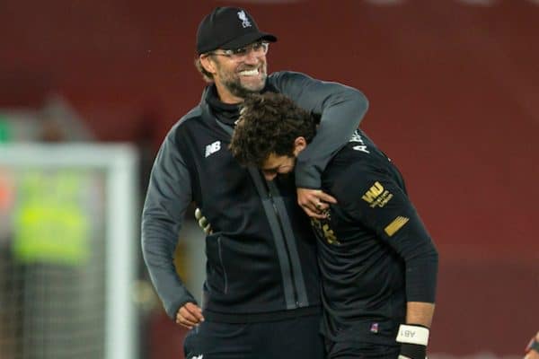 LIVERPOOL, ENGLAND - Wednesday, June 24, 2020: Liverpool’s manager Jürgen Klopp embraces goalkeeper Alisson Becker after the FA Premier League match between Liverpool FC and Crystal Palace FC at Anfield. The game was played behind closed doors due to the UK government’s social distancing laws during the Coronavirus COVID-19 Pandemic. Liverpool won 4-0. (Pic by David Rawcliffe/Propaganda)