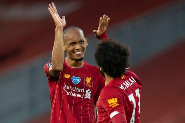 LIVERPOOL, ENGLAND - Wednesday, June 24, 2020: Liverpool’s Fabio Henrique Tavares 'Fabinho' (L) celebrates scoring the third goal with team-mate Mohamed Salah (R) during the FA Premier League match between Liverpool FC and Crystal Palace FC at Anfield. The game was played behind closed doors due to the UK government’s social distancing laws during the Coronavirus COVID-19 Pandemic. (Pic by David Rawcliffe/Propaganda)