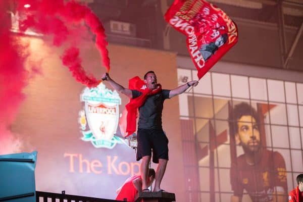 LIVERPOOL, ENGLAND - Thursday, June 25, 2020: Liverpool supporters congregate outside the famous Spion Kop at Anfield as they celebrate after their side were crowned Premier League Champions following Manchester City's defeat by Chelsea. The supporters have waited 30 years for this their 19th Championship title. (Pic by David Rawcliffe/Propaganda)