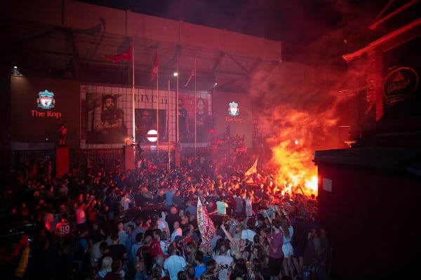 LIVERPOOL, ENGLAND - Thursday, June 25, 2020: Liverpool supporters congregate outside the famous Spion Kop at Anfield as they celebrate after their side were crowned Premier League Champions following Manchester City's defeat by Chelsea. The supporters have waited 30 years for this their 19th Championship title. (Pic by David Rawcliffe/Propaganda)