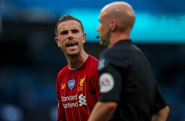 MANCHESTER, ENGLAND - Thursday, July 2, 2020: Liverpool’s captain Jordan Henderson speaks with referee Anthony Taylor during the FA Premier League match between Manchester City FC and Liverpool FC at the City of Manchester Stadium. The game was played behind closed doors due to the UK government’s social distancing laws during the Coronavirus COVID-19 Pandemic. This was Liverpool's first game as Premier League 2019/20 Champions. (Pic by Propaganda)