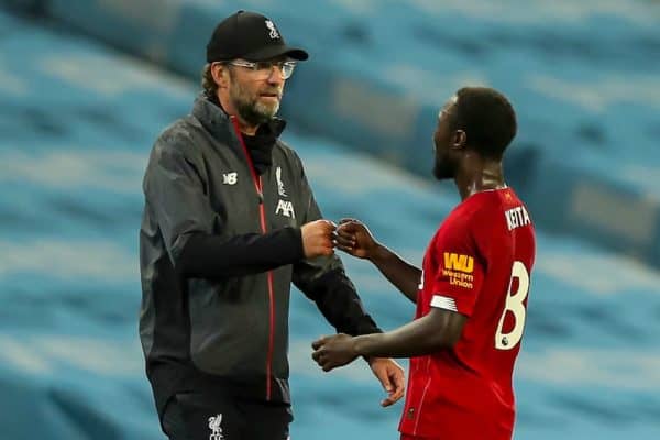 MANCHESTER, ENGLAND - Thursday, July 2, 2020: Liverpool’s manager Jürgen Klopp with Naby Keita after the FA Premier League match between Manchester City FC and Liverpool FC at the City of Manchester Stadium. The game was played behind closed doors due to the UK government’s social distancing laws during the Coronavirus COVID-19 Pandemic. This was Liverpool's first game as Premier League 2019/20 Champions. Manchester City won 4-0. (Pic by Propaganda)