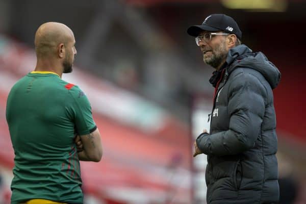 LIVERPOOL, ENGLAND - Sunday, July 5, 2020: Liverpool’s manager Jürgen Klopp chats with former goalkeeper Pepe Reina after the FA Premier League match between Liverpool FC and Aston Villa FC at Anfield. The game was played behind closed doors due to the UK government’s social distancing laws during the Coronavirus COVID-19 Pandemic. (Pic by David Rawcliffe/Propaganda)