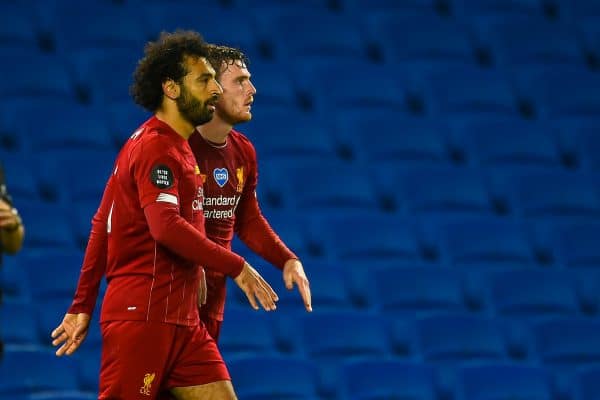 BRIGHTON & HOVE, ENGLAND - Wednesday, July 8, 2020: Liverpool's Mohamed Salah (L) celebrates scoring the third goal, his second of the game, with team-mate Andy Robertson (R) during the FA Premier League match between Brighton & Hove Albion FC and Liverpool FC at the AMEX Stadium. The game was played behind closed doors due to the UK government’s social distancing laws during the Coronavirus COVID-19 Pandemic. (Pic by Propaganda)