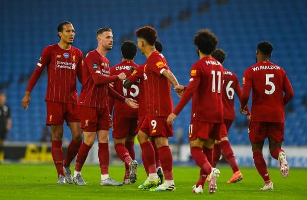 BRIGHTON & HOVE, ENGLAND - Wednesday, July 8, 2020: Liverpool's Virgil van Dijk, captain Jordan Henderson and Roberto Firmino celebrates with opening goal scorer Mohamed Salah during the FA Premier League match between Brighton & Hove Albion FC and Liverpool FC at the AMEX Stadium. The game was played behind closed doors due to the UK government’s social distancing laws during the Coronavirus COVID-19 Pandemic. (Pic by Propaganda)