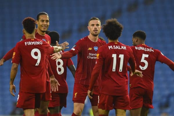 BRIGHTON & HOVE, ENGLAND - Wednesday, July 8, 2020: Liverpool's captain Jordan Henderson (C) celebrates with the opening goal scorer Mohamed Salah during the FA Premier League match between Brighton & Hove Albion FC and Liverpool FC at the AMEX Stadium. The game was played behind closed doors due to the UK government’s social distancing laws during the Coronavirus COVID-19 Pandemic. (Pic by Propaganda)