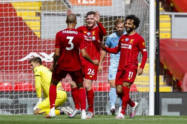 LIVERPOOL, ENGLAND - Saturday, July 11, 2020: Liverpool’s Andy Robertson (C) celebrates scoring the first goal with team-mates Fabio Henrique Tavares 'Fabinho' (L) and Mohamed Salah (R) during the FA Premier League match between Liverpool FC and Burnley FC at Anfield. The game was played behind closed doors due to the UK government’s social distancing laws during the Coronavirus COVID-19 Pandemic. (Pic by Propaganda)