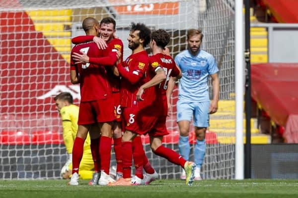 LIVERPOOL, ENGLAND - Saturday, July 11, 2020: Liverpool’s Andy Robertson (C) celebrates scoring the first goal with team-mates Fabio Henrique Tavares 'Fabinho' (L) and Mohamed Salah (R) during the FA Premier League match between Liverpool FC and Burnley FC at Anfield. The game was played behind closed doors due to the UK government’s social distancing laws during the Coronavirus COVID-19 Pandemic. (Pic by Propaganda)