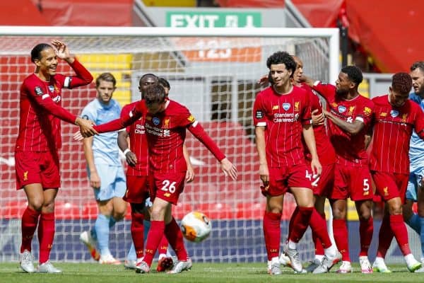 LIVERPOOL, ENGLAND - Saturday, July 11, 2020: Liverpool’s Andy Robertson (C) celebrates scoring the first goal during the FA Premier League match between Liverpool FC and Burnley FC at Anfield. The game was played behind closed doors due to the UK government’s social distancing laws during the Coronavirus COVID-19 Pandemic. (Pic by Propaganda)