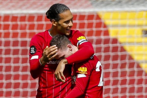 LIVERPOOL, ENGLAND - Saturday, July 11, 2020: Liverpool’s Andy Robertson (R) celebrates scoring the first goal with team-mate Virgil van Dijk during the FA Premier League match between Liverpool FC and Burnley FC at Anfield. The game was played behind closed doors due to the UK government’s social distancing laws during the Coronavirus COVID-19 Pandemic. (Pic by Propaganda)