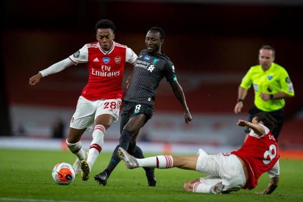 LONDON, ENGLAND - Tuesday, July 14, 2020: Liverpool’s Naby Keita (C) and Arsenal's Joe Willock (L) during the FA Premier League match between Arsenal FC and Liverpool FC at the Emirates Stadium. The game was played behind closed doors due to the UK government’s social distancing laws during the Coronavirus COVID-19 Pandemic. (Pic by David Rawcliffe/Propaganda)