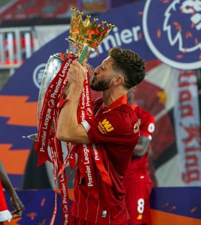 LIVERPOOL, ENGLAND - Wednesday, July 22, 2020: Liverpool’s Adam Lallana kisses the trophy after the FA Premier League match between Liverpool FC and Chelsea FC at Anfield. The game was played behind closed doors due to the UK government’s social distancing laws during the Coronavirus COVID-19 Pandemic. (Pic by David Rawcliffe/Propaganda)