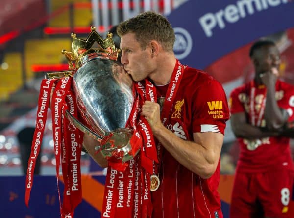 LIVERPOOL, ENGLAND - Wednesday, July 22, 2020: Liverpool’s James Milner kisses the trophy after the FA Premier League match between Liverpool FC and Chelsea FC at Anfield. The game was played behind closed doors due to the UK government’s social distancing laws during the Coronavirus COVID-19 Pandemic. (Pic by David Rawcliffe/Propaganda)