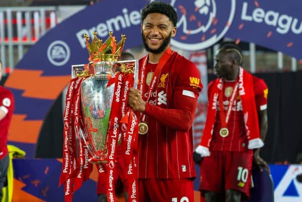 LIVERPOOL, ENGLAND - Wednesday, July 22, 2020: Liverpool’s Joe Gomez the trophy after the FA Premier League match between Liverpool FC and Chelsea FC at Anfield. The game was played behind closed doors due to the UK government’s social distancing laws during the Coronavirus COVID-19 Pandemic. (Pic by David Rawcliffe/Propaganda)