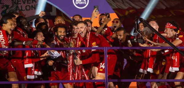 LIVERPOOL, ENGLAND - Wednesday, July 22, 2020: Liverpool’s captain Jordan Henderson lifts the Premier League trophy after the FA Premier League match between Liverpool FC and Chelsea FC at Anfield. The game was played behind closed doors due to the UK government’s social distancing laws during the Coronavirus COVID-19 Pandemic. Liverpool won 5-3. (Pic by David Rawcliffe/Propaganda)