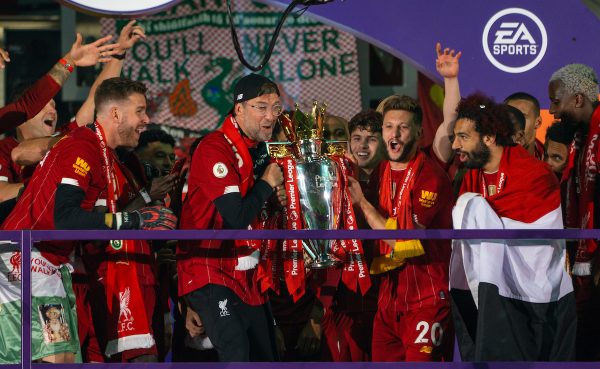 LIVERPOOL, ENGLAND - Wednesday, July 22, 2020: Liverpool’s manager Jürgen Klopp (L) and Adam Lallana lift the Premier League trophy after the FA Premier League match between Liverpool FC and Chelsea FC at Anfield. The game was played behind closed doors due to the UK government’s social distancing laws during the Coronavirus COVID-19 Pandemic. Liverpool won 5-3. (Pic by David Rawcliffe/Propaganda)