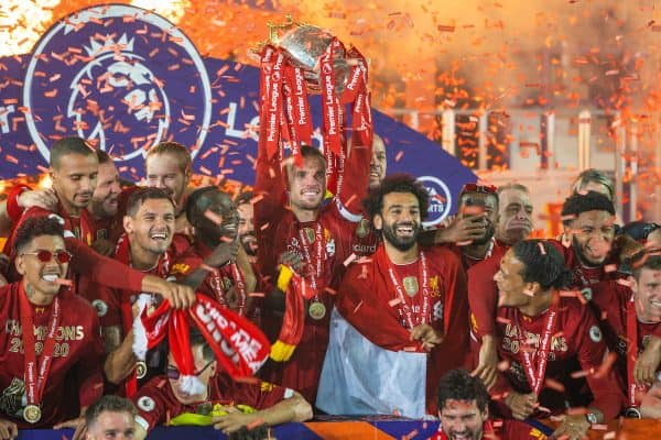 LIVERPOOL, ENGLAND - Wednesday, July 22, 2020: Liverpool’s captain Jordan Henderson lifts the Premier League trophy after the FA Premier League match between Liverpool FC and Chelsea FC at Anfield. The game was played behind closed doors due to the UK government’s social distancing laws during the Coronavirus COVID-19 Pandemic. Liverpool won 5-3. (Pic by David Rawcliffe/Propaganda)