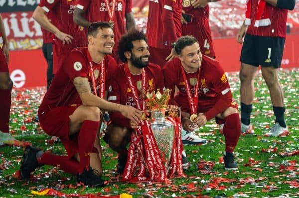 LIVERPOOL, ENGLAND - Wednesday, July 22, 2020: Liverpool’s Dejan Lovren, Mohamed Salah and Xherdan Shaqiri celebrate with the Premier League trophy as they are crowned Champions after the FA Premier League match between Liverpool FC and Chelsea FC at Anfield. The game was played behind closed doors due to the UK government’s social distancing laws during the Coronavirus COVID-19 Pandemic. Liverpool won 5-3. (Pic by David Rawcliffe/Propaganda)