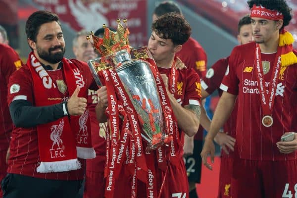 LIVERPOOL, ENGLAND - Wednesday, July 22, 2020: Liverpool’s Neco Williams kisses the Premier League trophy as his side are crowned Champions after the FA Premier League match between Liverpool FC and Chelsea FC at Anfield. The game was played behind closed doors due to the UK government’s social distancing laws during the Coronavirus COVID-19 Pandemic. Liverpool won 5-3. (Pic by David Rawcliffe/Propaganda)