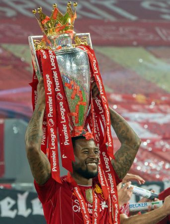 LIVERPOOL, ENGLAND - Wednesday, July 22, 2020: Liverpool’s Georginio Wijnaldum celebrates with the Premier League trophy as his side are crowned Champions after the FA Premier League match between Liverpool FC and Chelsea FC at Anfield. The game was played behind closed doors due to the UK government’s social distancing laws during the Coronavirus COVID-19 Pandemic. Liverpool won 5-3. (Pic by David Rawcliffe/Propaganda)