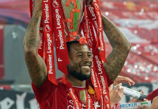 LIVERPOOL, ENGLAND - Wednesday, July 22, 2020: Liverpool’s Georginio Wijnaldum celebrates with the Premier League trophy as his side are crowned Champions after the FA Premier League match between Liverpool FC and Chelsea FC at Anfield. The game was played behind closed doors due to the UK government’s social distancing laws during the Coronavirus COVID-19 Pandemic. Liverpool won 5-3. (Pic by David Rawcliffe/Propaganda)