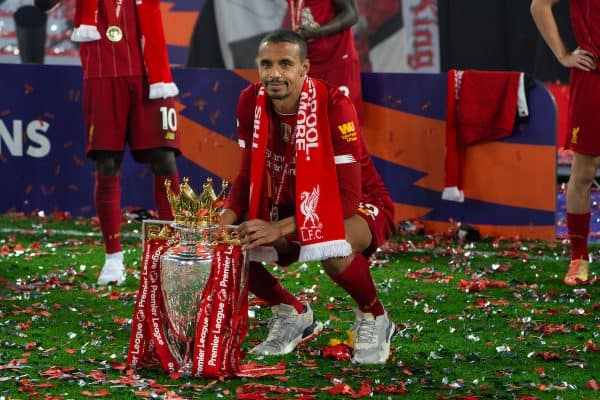 LIVERPOOL, ENGLAND - Wednesday, July 22, 2020: Liverpool’s Joe Gomez celebrates with the Premier League trophy as his side are crowned Champions after the FA Premier League match between Liverpool FC and Chelsea FC at Anfield. The game was played behind closed doors due to the UK government’s social distancing laws during the Coronavirus COVID-19 Pandemic. Liverpool won 5-3. (Pic by David Rawcliffe/Propaganda)