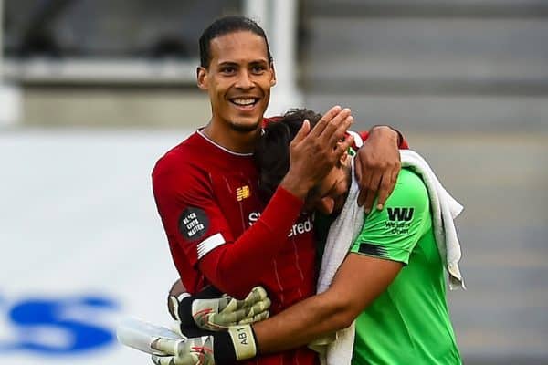 LIVERPOOL, ENGLAND - Sunday, July 26, 2020: Liverpool’s Virgil van Dijk (L) celebrates with goalkeeper Alisson Becker after the final match of the FA Premier League season between Newcastle United FC and Liverpool FC at St. James' Park. The game was played behind closed doors due to the UK government’s social distancing laws during the Coronavirus COVID-19 Pandemic. Liverpool won 3-1 and finished the season as Champions on 99 points. (Pic by Propaganda)