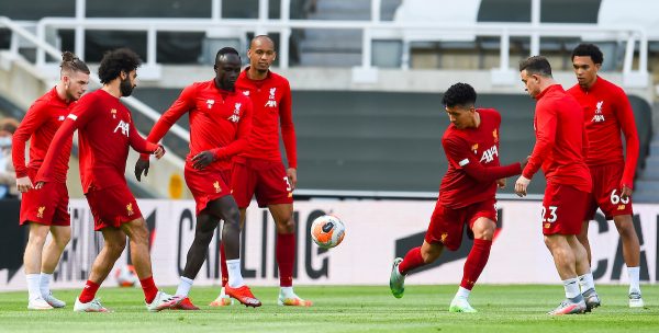 LIVERPOOL, ENGLAND - Sunday, July 26, 2020: Liverpool’s Sadio Mané (L) and Roberto Firmino during the pre-match warm-up before the final match of the FA Premier League season between Newcastle United FC and Liverpool FC at St. James' Park. The game was played behind closed doors due to the UK government’s social distancing laws during the Coronavirus COVID-19 Pandemic. (Pic by David Rawcliffe/Propagandab)