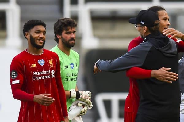 LIVERPOOL, ENGLAND - Sunday, July 26, 2020: Liverpool’s Virgil van Dijk celebrates with manager Jürgen Klopp after the final match of the FA Premier League season between Newcastle United FC and Liverpool FC at St. James' Park. The game was played behind closed doors due to the UK government’s social distancing laws during the Coronavirus COVID-19 Pandemic. Liverpool won 3-1 and finished the season as Champions on 99 points. (Pic by Propaganda)