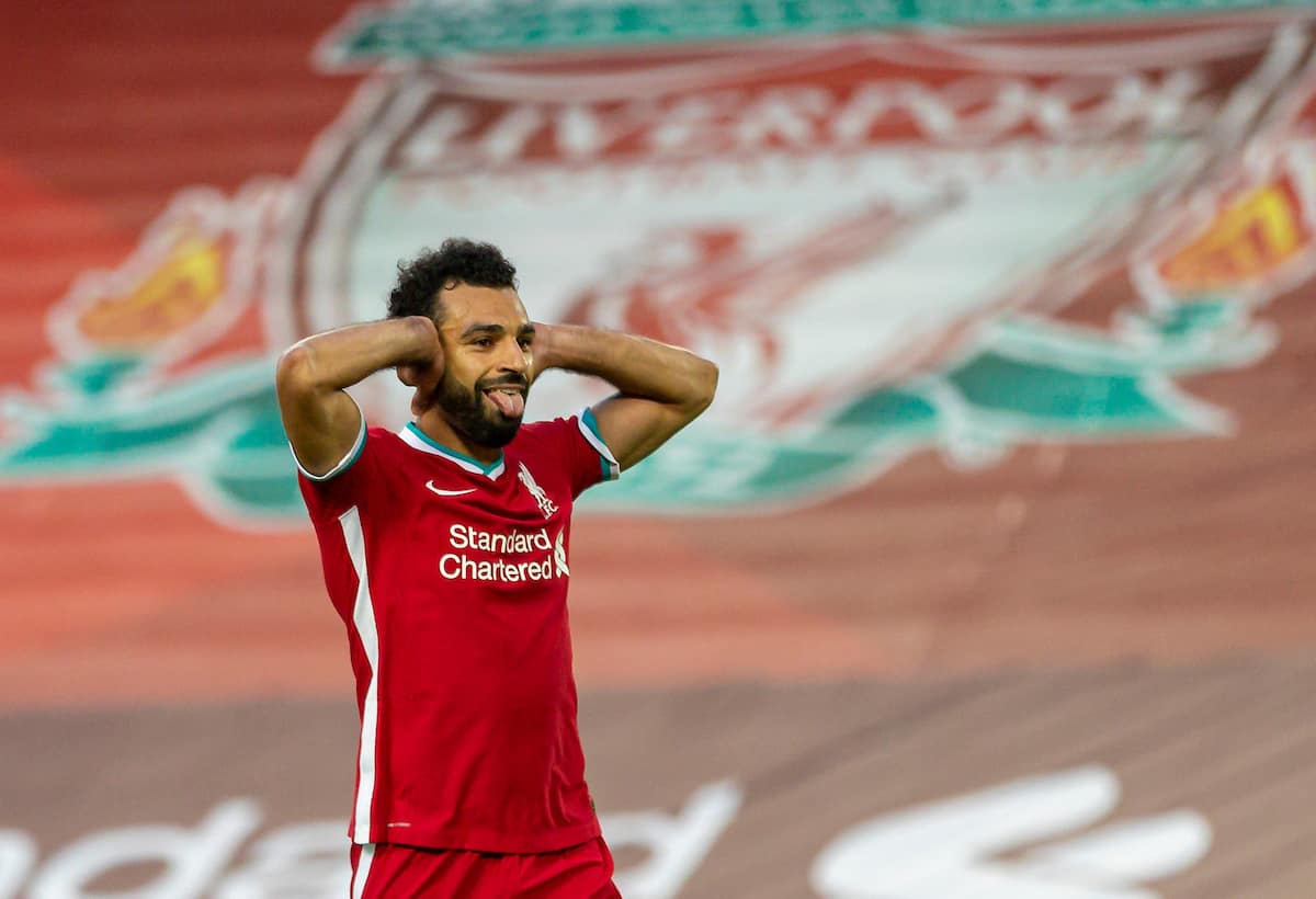 LIVERPOOL, ENGLAND - Saturday, September 12, 2020: Liverpool’s Mohamed Salah celebrates after scoring the fourth goal, his hat-trick, from a penalty-kick to make the score 4-3 during the opening FA Premier League match between Liverpool FC and Leeds United FC at Anfield. The game was played behind closed doors due to the UK government’s social distancing laws during the Coronavirus COVID-19 Pandemic. (Pic by David Rawcliffe/Propaganda)