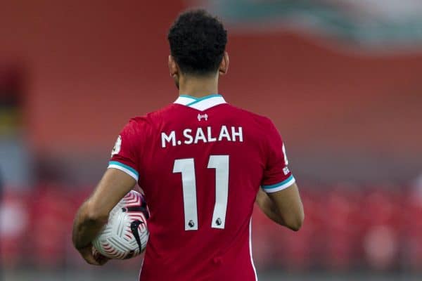 LIVERPOOL, ENGLAND - Saturday, September 12, 2020: Liverpool’s hat-trick hero Mohamed Salah walks off with the match ball after the opening FA Premier League match between Liverpool FC and Leeds United FC at Anfield. The game was played behind closed doors due to the UK government’s social distancing laws during the Coronavirus COVID-19 Pandemic. Liverpool won 4-3. (Pic by David Rawcliffe/Propaganda)