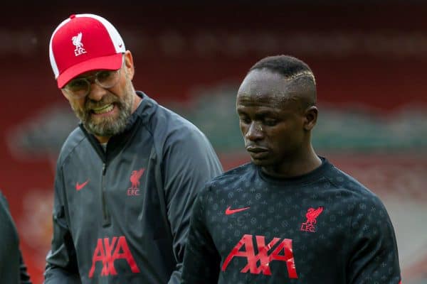 LIVERPOOL, ENGLAND - Saturday, September 12, 2020: Liverpool’s manager Jürgen Klopp speaks with Sadio Mané (R) during the pre-match warm-up before the opening FA Premier League match between Liverpool FC and Leeds United FC at Anfield. The game was played behind closed doors due to the UK government’s social distancing laws during the Coronavirus COVID-19 Pandemic. (Pic by David Rawcliffe/Propaganda)