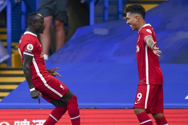 LONDON, ENGLAND - Sunday, September 20, 2020: Liverpool's Sadio Mané (L) celebrates with team-mate Roberto Firmino (R) after scoring the first goal with a header during the FA Premier League match between Chelsea FC and Liverpool FC at Stamford Bridge. The game was played behind closed doors due to the UK government’s social distancing laws during the Coronavirus COVID-19 Pandemic. (Pic by Propaganda)