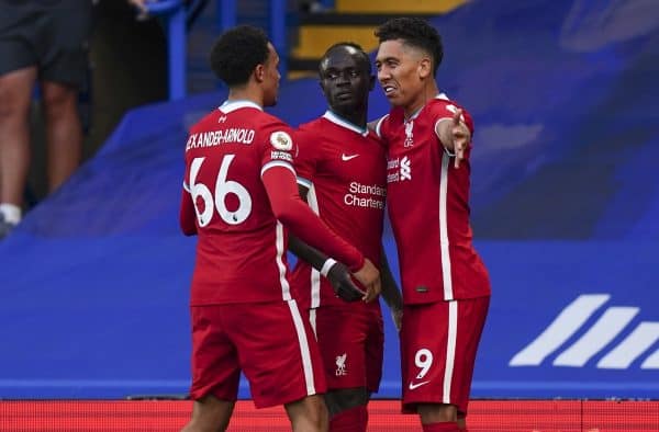 LONDON, ENGLAND - Sunday, September 20, 2020: Liverpool's Sadio Mané (C) celebrates with team-mates Trent Alexander-Arnold (L) and Roberto Firmino (R) after scoring the first goal with a header during the FA Premier League match between Chelsea FC and Liverpool FC at Stamford Bridge. The game was played behind closed doors due to the UK government’s social distancing laws during the Coronavirus COVID-19 Pandemic. (Pic by Propaganda)