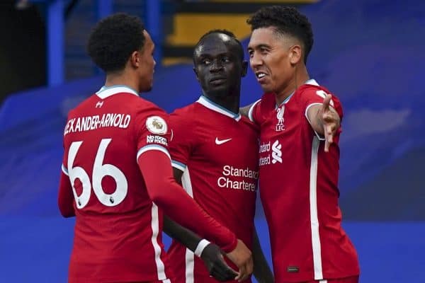 LONDON, ENGLAND - Sunday, September 20, 2020: Liverpool's Sadio Mané (C) celebrates with team-mates Trent Alexander-Arnold (L) and Roberto Firmino (R) after scoring the first goal with a header during the FA Premier League match between Chelsea FC and Liverpool FC at Stamford Bridge. The game was played behind closed doors due to the UK government's social distancing laws during the Coronavirus COVID-19 Pandemic. (Pic by Propaganda)