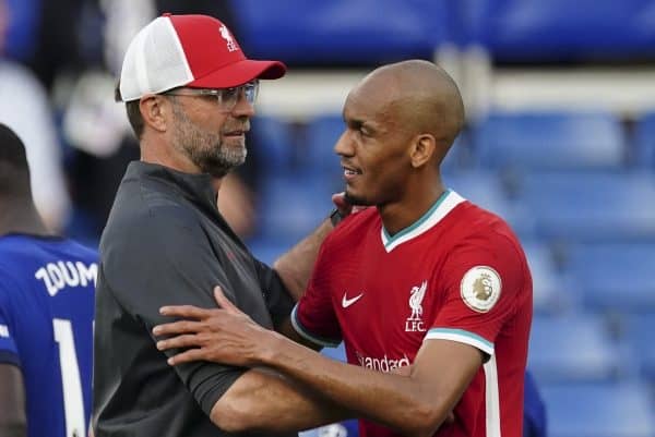 LONDON, ENGLAND - Sunday, September 20, 2020: Liverpool's manager Jürgen Klopp embraces Fabio Henrique Tavares 'Fabinho' after the FA Premier League match between Chelsea FC and Liverpool FC at Stamford Bridge. The game was played behind closed doors due to the UK government's social distancing laws during the Coronavirus COVID-19 Pandemic. (Pic by Propaganda)