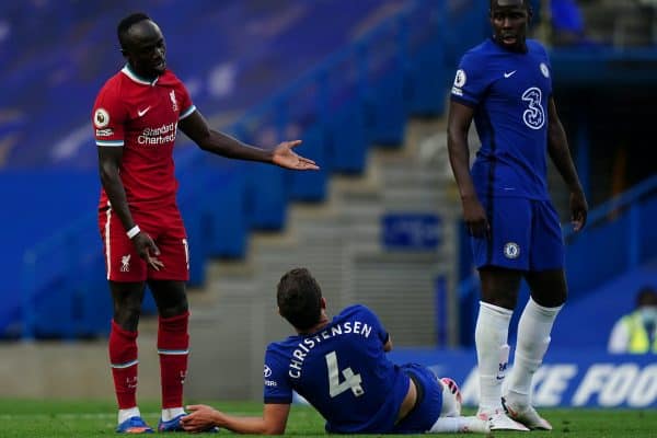 LONDON, ENGLAND - Sunday, September 20, 2020: Liverpool’s Sadio Mané (L) speaks with Chelsea's captain Andreas Christensen after being fouled, the Chelse player was later shown a red card for the challenge after a VAT review, during the FA Premier League match between Chelsea FC and Liverpool FC at Stamford Bridge. The game was played behind closed doors due to the UK government’s social distancing laws during the Coronavirus COVID-19 Pandemic. (Pic by Propaganda)