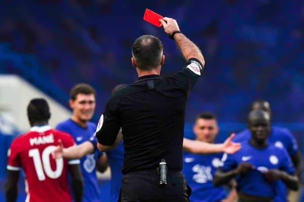 LONDON, ENGLAND - Sunday, September 20, 2020: Referee Paul Tierney shows a red card to Chelsea's Andreas Christensen (hidden) during the FA Premier League match between Chelsea FC and Liverpool FC at Stamford Bridge. The game was played behind closed doors due to the UK government’s social distancing laws during the Coronavirus COVID-19 Pandemic. (Pic by Propaganda)