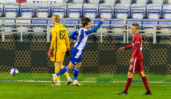 WIGAN, ENGLAND - Tuesday, September 22, 2020: Wigan Athletic's Charlie Jolley celebrates scoring his side's first equalising goal to make the score 1-1 during the EFL Trophy Northern Group D match between Wigan Athletic and Liverpool FC Under-21's at the DW Stadium. (Pic by David Rawcliffe/Propaganda)