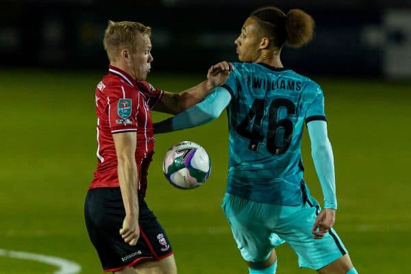 LINCOLN, ENGLAND - Thursday, September 24, 2020: Liverpool's Rhys Williams (R) and Lincoln City FC's James Jones during the Football League Cup 3rd Round match between Lincoln City FC and Liverpool FC at Sincil Bank. (Pic by David Rawcliffe/Propaganda)