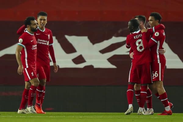 LIVERPOOL, ENGLAND - Monday, September 28, 2020: Liverpool’s Andy Robertson (R hidden) celebrates scoring the second goal to make the score 2-1 with team-mates during the FA Premier League match between Liverpool FC and Arsenal FC at Anfield. The game was played behind closed doors due to the UK government’s social distancing laws during the Coronavirus COVID-19 Pandemic. (Pic by Propaganda)