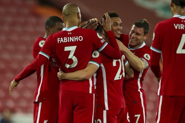 LIVERPOOL, ENGLAND - Monday, September 28, 2020: Liverpool players celebrate with goal-scorer Diogo Jota after he scores the third goal to make the score 3-1 during the FA Premier League match between Liverpool FC and Arsenal FC at Anfield. The game was played behind closed doors due to the UK government’s social distancing laws during the Coronavirus COVID-19 Pandemic. (Pic by Propaganda)