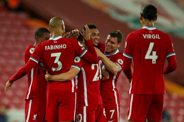 LIVERPOOL, ENGLAND - Monday, September 28, 2020: Liverpool players celebrate with goal-scorer Diogo Jota after he scores the third goal to make the score 3-1 during the FA Premier League match between Liverpool FC and Arsenal FC at Anfield. The game was played behind closed doors due to the UK government’s social distancing laws during the Coronavirus COVID-19 Pandemic. (Pic by Propaganda)