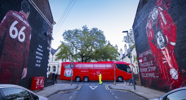 LIVERPOOL, ENGLAND - Thursday, October 1, 2020: Liverpool's team coach passes by two street art murals, on the left featuring Trent Alexander-Arnold commissioned by The Anfield Wrap, and on the right the club's captain Jordan Henderson commissioned by The Redmen TV, pictured before the Football League Cup 4th Round match between Liverpool FC and Arsenal FC at Anfield. (Pic by David Rawcliffe/Propaganda)