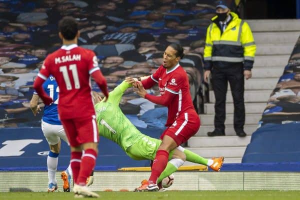 LIVERPOOL, ENGLAND - Saturday, October 17, 2020: Liverpool’s Virgil van Dijk is fouled by Everton's goalkeeper Jordan Pickford during the FA Premier League match between Everton FC and Liverpool FC, the 237th Merseyside Derby, at Goodison Park. The game was played behind closed doors due to the UK government’s social distancing laws during the Coronavirus COVID-19 Pandemic. (Pic by David Rawcliffe/Propaganda)