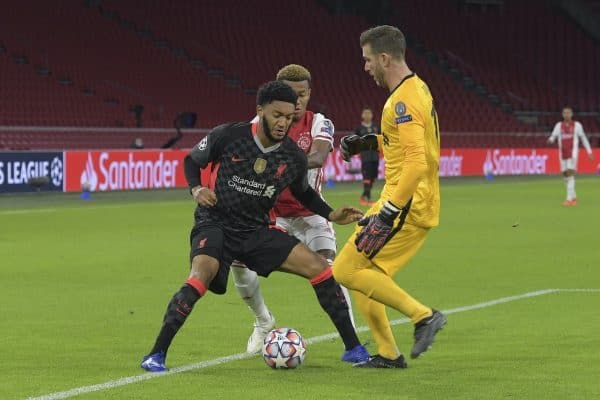 AMSTERDAM, THE NETHERLANDS - Wednesday, October 21, 2020: A mix-up between Liverpool's Joe Gomez (L) and goalkeeper Adrián San Miguel del Castillo during the opening UEFA Champions League Group D match between AFC Ajax and Liverpool FC at the Johan Cruijff ArenA. (Pic by Gerrit van Keulen/Orange Pictures via Propaganda)