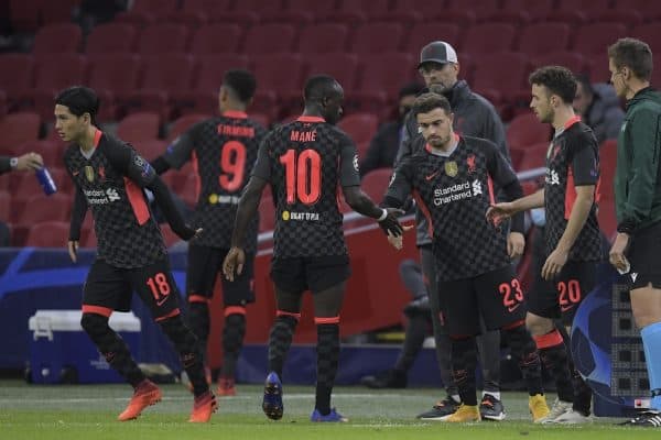 AMSTERDAM, THE NETHERLANDS - Wednesday, October 21, 2020: Liverpool make a triple substitution bringing on Takumi Minamino, Xherdan Shaqiri and Diogo Jota during the opening UEFA Champions League Group D match between AFC Ajax and Liverpool FC at the Johan Cruijff ArenA. (Pic by Gerrit van Keulen/Orange Pictures via Propaganda)