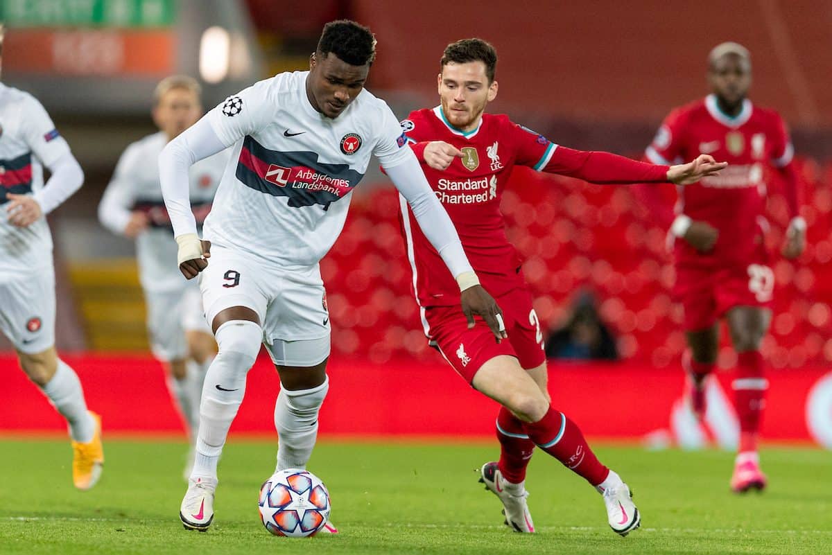 LIVERPOOL, ENGLAND - Tuesday, October 27, 2020: FC Midtjylland's Sory Kaba (L) and Liverpool's Andy Robertson during the UEFA Champions League Group D match between Liverpool FC and FC Midtjylland at Anfield. (Pic by David Rawcliffe/Propaganda)