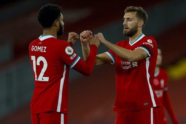 LIVERPOOL, ENGLAND - Saturday, October 31, 2020: Liverpool’s Nathaniel Phillips (R) with Joe Gomez before making his debut during the FA Premier League match between Liverpool FC and West Ham United FC at Anfield. The game was played behind closed doors due to the UK government’s social distancing laws during the Coronavirus COVID-19 Pandemic. (Pic by Propaganda)